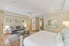 Bedroom 1: Master Suite, King Bed, Sitting Area with Sofa, Private Bath (dual vanities, walk-in shower, separate soaking tub), First Floor