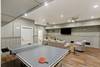 Basement Living Room with TV and Ping Pong