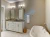 Double vanity, stand alone bathtub and large walk-in shower