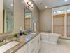 Double vanity, stand alone bathtub and large walk-in shower