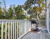 Gas grill on the back deck.