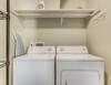 Laundry room located off the kitchen.