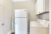 Laundry Area with Additional Fridge!