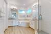 1st floor master bathroom with double vanities, garden tub and walk-in shower