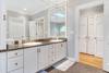 Master bath with shower and soaking tub.