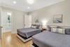 Bedroom 1 with two queens and en-suite. First Floor