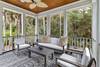 Screened porch off of pool area.
