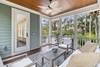 Screened porch off of pool area.