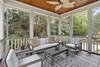 Screened porch off of pool area.