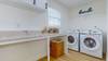 Laundry Room with Full Size Washer and Dryer (Laundry Detergent Not Provided)