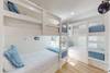 Bedroom Four: 2 Sets of Twin/Twin Bunk Beds