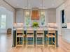 Custom kitchen and island with bar stools