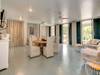 Card table, TV, patio with corn hole, outside shower.