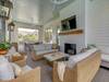 TV and multiple seating options. Pool deck access.