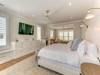 Sitting room with desk, coffee bar, TV, front porch access, ensuite bathroom with huge stand up shower, double vanity, make-up vanity, soaking tub. Ocean Views from the sitting area and from the bed!
