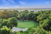 Aerial View of Neighborhood, Nearby Marshes, and Cougar Point Golf Course