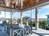 Second floor porch swing with ocean views