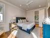 Bedroom 6 with king bed on first floor with ensuite bathroom