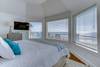Bedroom 4 on second floor with king bed and ocean views