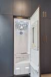 Clothing Steamer in Laundry Room