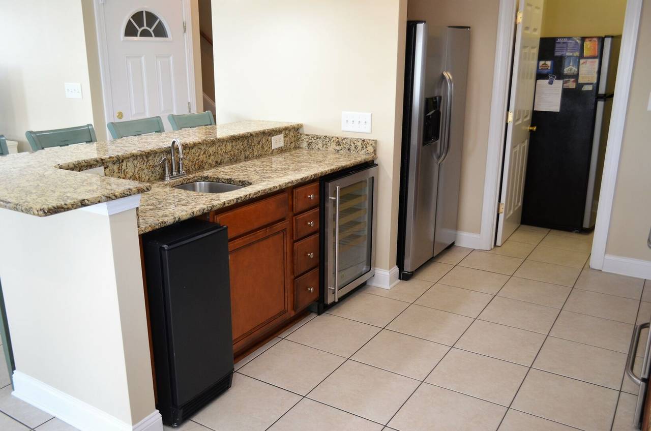 Two Refrigerators plus a Wine Cooler Two Refrigerators plus a Wine Cooler