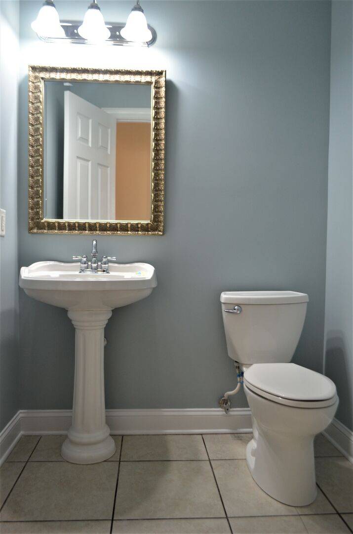 Half Bathroom off Hallway Half Bathroom off Hallway