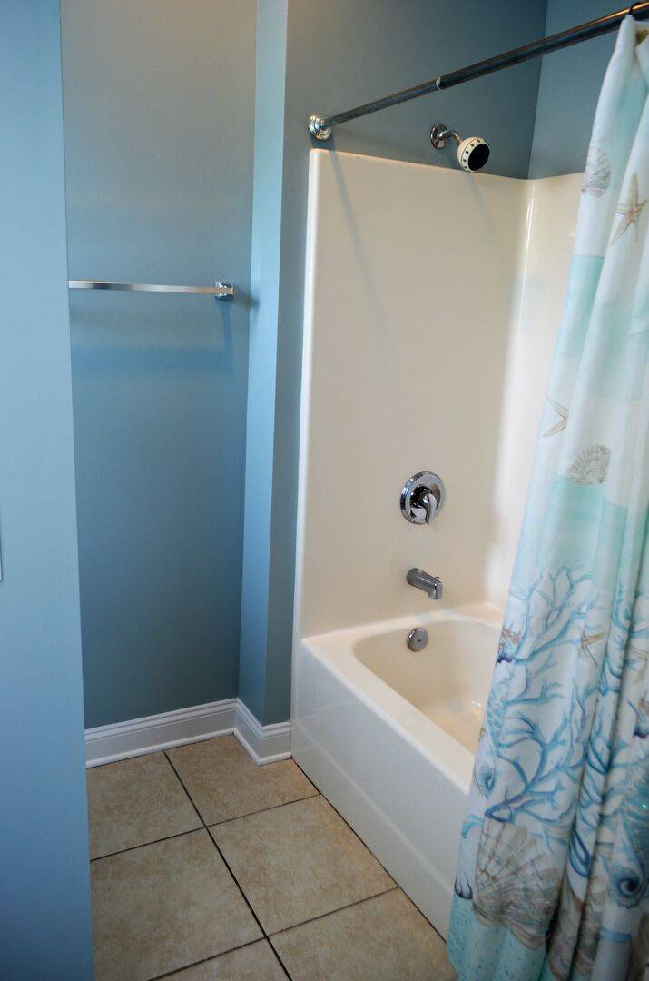 has a shower/tub combo. has a shower/tub combo.