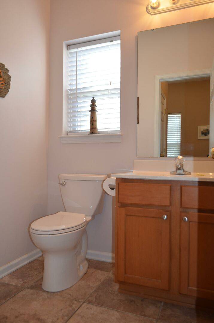 Half Bathroom off Downstairs Hallway Half Bathroom off Downstairs Hallway