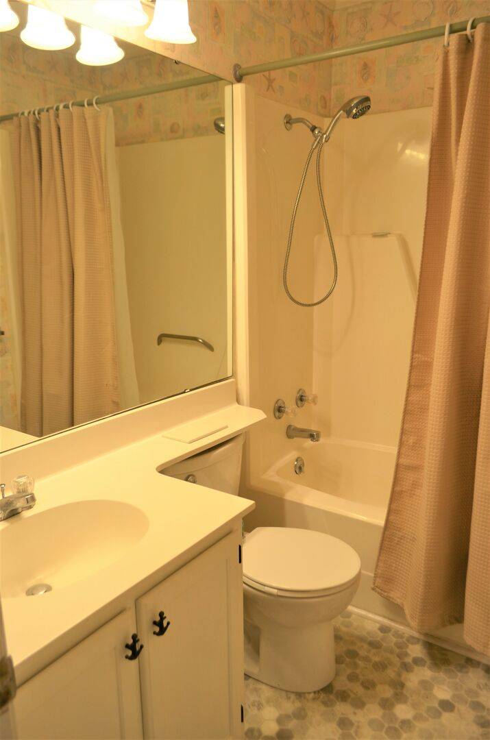 Hall Bathroom with a Shower/Tub Combo Hall Bathroom with a Shower/Tub Combo