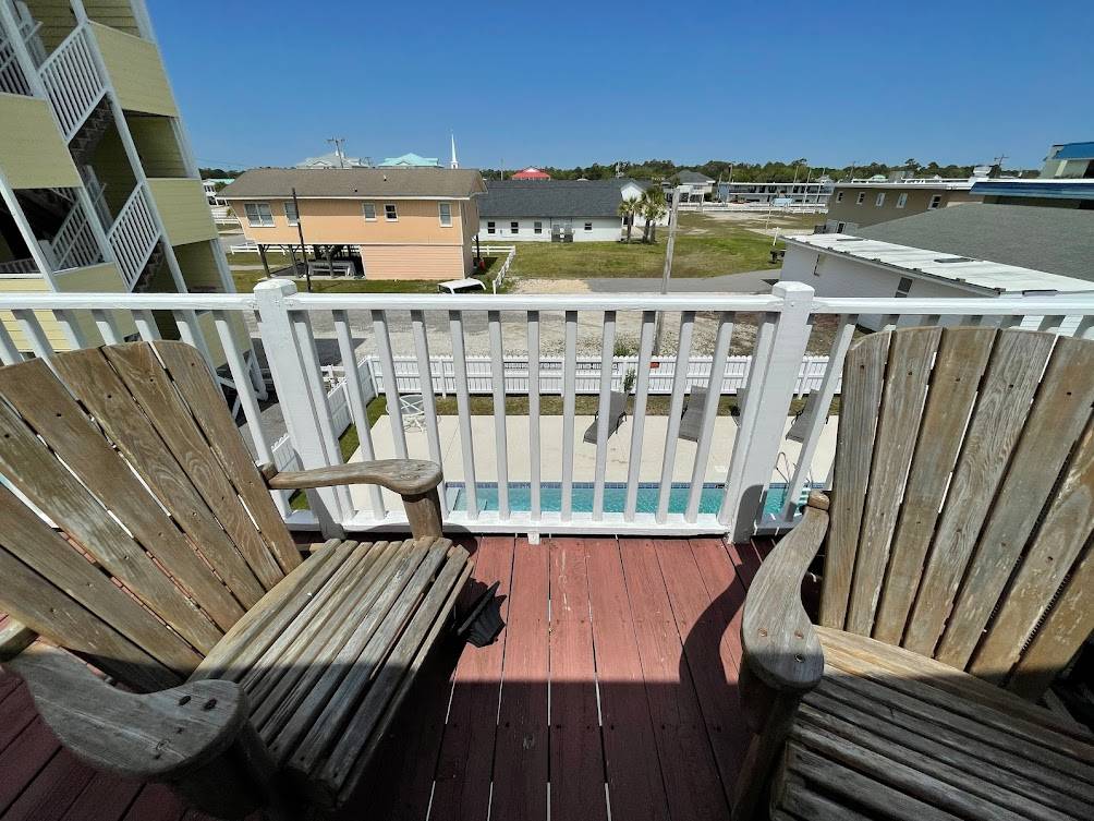Rear deck overlooking pool Rear deck overlooking pool