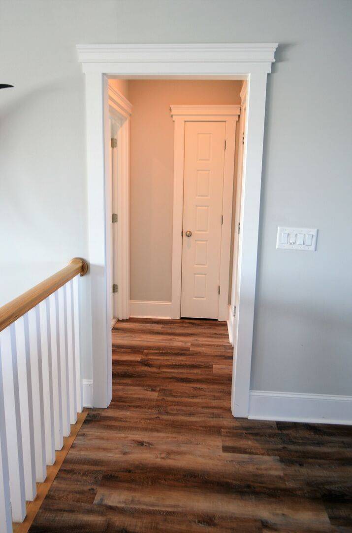 Entrance to bedroom 7 and upper laundry closet Entrance to bedroom 7 and upper laundry closet