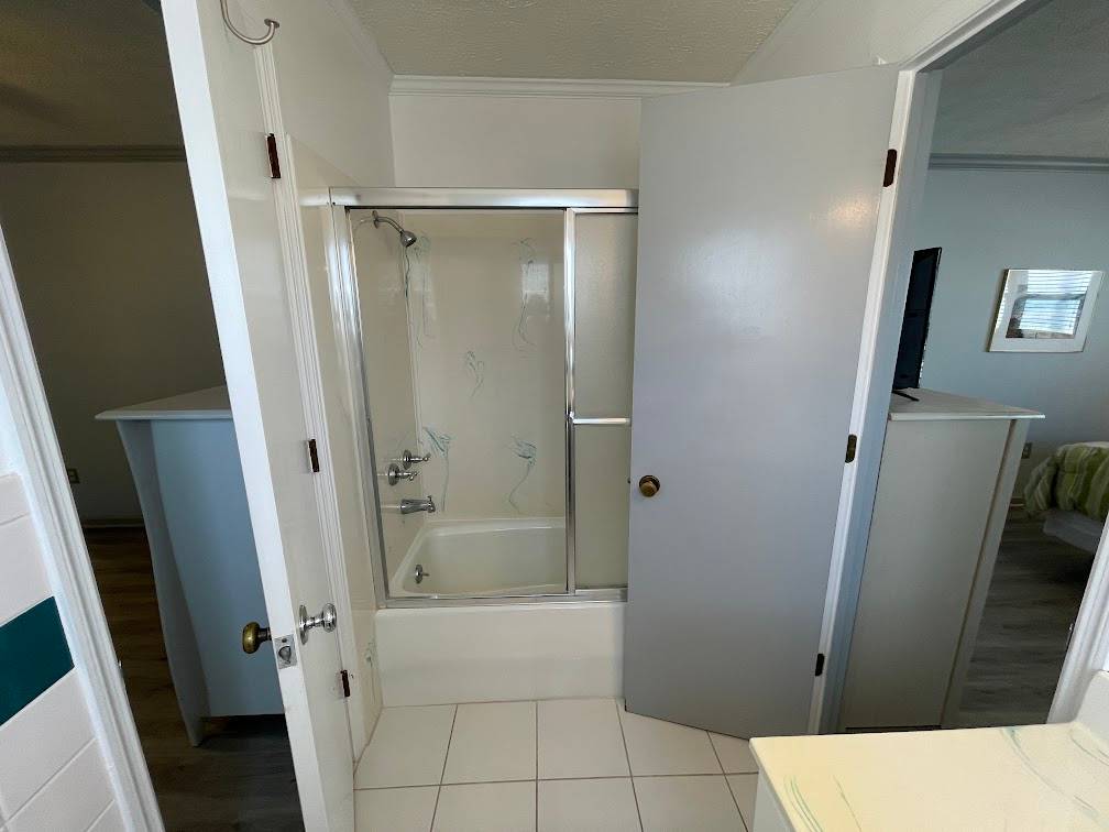 Bath shared with bedrooms 1 and 2 Bath shared with bedrooms 1 and 2