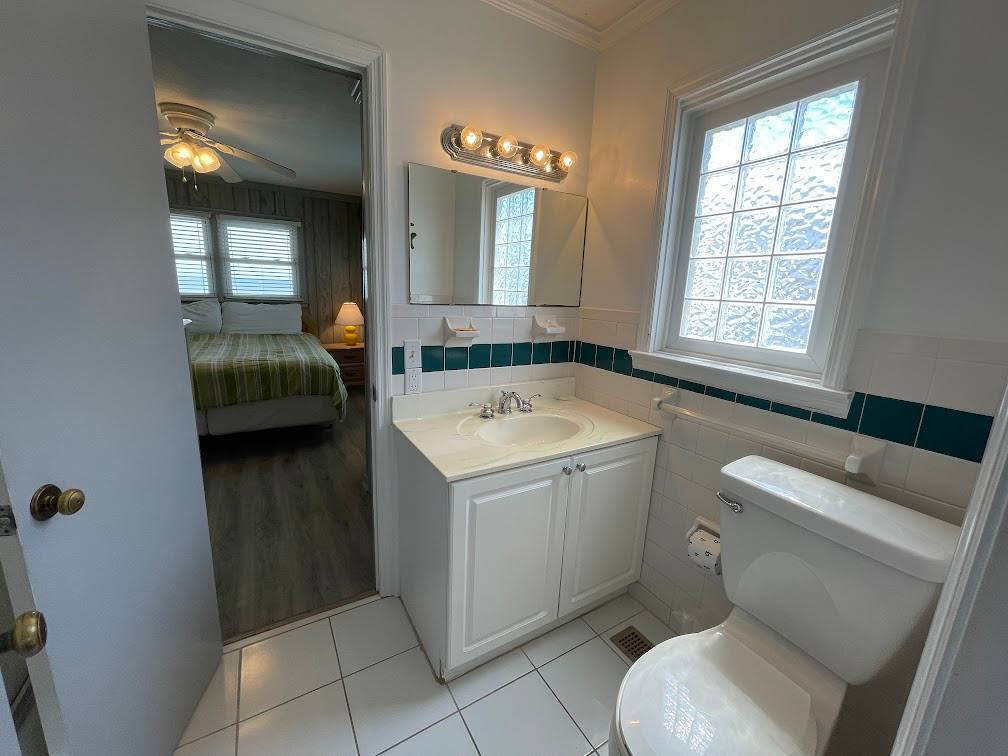 Bath shared with bedrooms 1 and 2 Bath shared with bedrooms 1 and 2