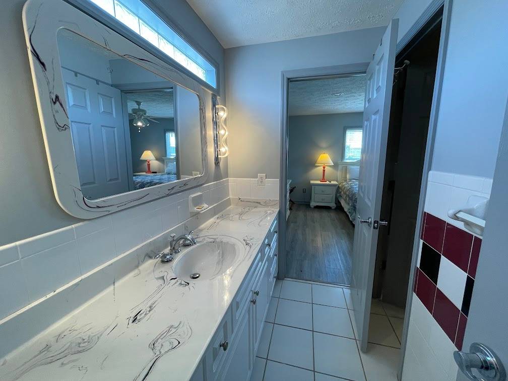 Private bath off of bedroom 5 Private bath off of bedroom 5