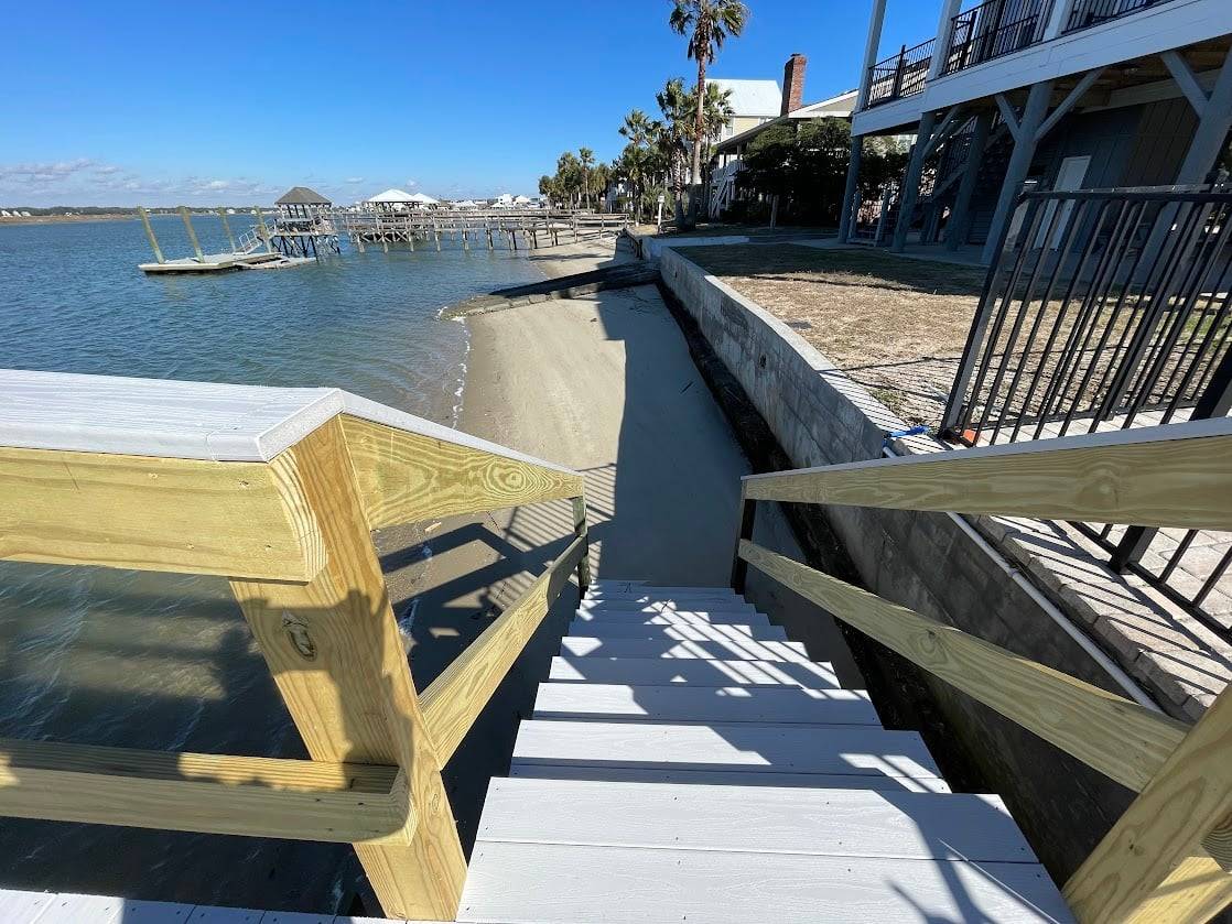 Stairs to low tide sandy beach like area Stairs to low tide sandy beach like area