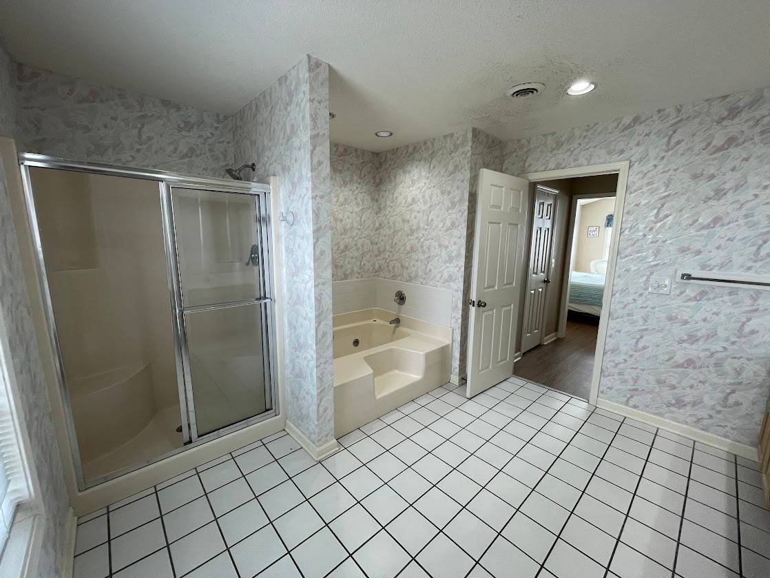 Shower and tub in private bath off of Bedroom 5 Shower and tub in private bath off of Bedroom 5