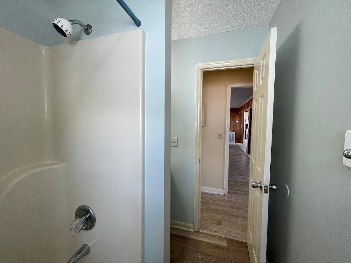 Hall bath down between bedrooms 1 and 2 Hall bath down between bedrooms 1 and 2