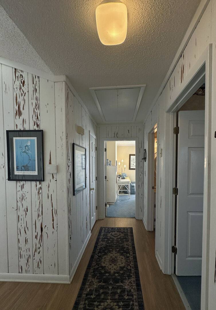Hallway to Bedroom 2 & 3, Hall Bath Hallway to Bedroom 2 & 3, Hall Bath