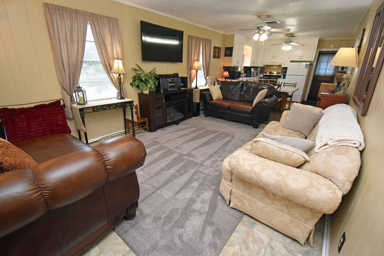 Open living, dining and kitchen area Open living, dining and kitchen area