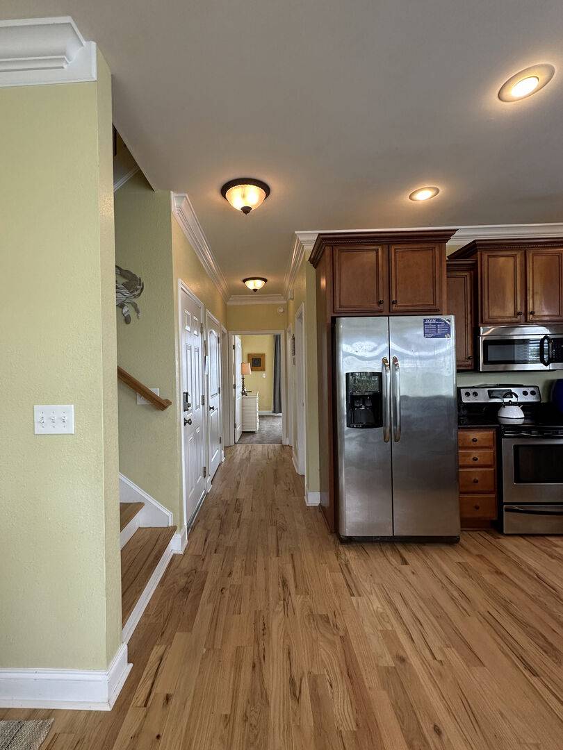 Hallway to Half Bath, Laundry & Bedroom 1 Hallway to Half Bath, Laundry & Bedroom 1