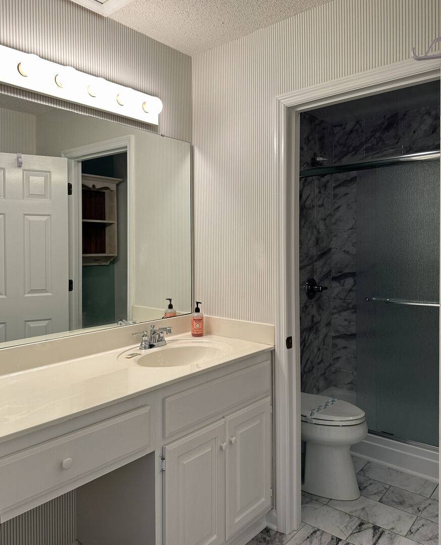 Bedroom 5 Private Bath with Walk-In Shower Bedroom 5 Private Bath with Walk-In Shower