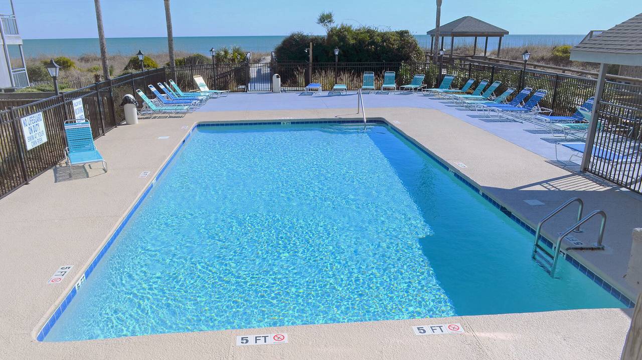 Lounge around the pool & enjoy the Atlantic Ocean backdrop! Lounge around the pool & enjoy the Atlantic Ocean backdrop!
