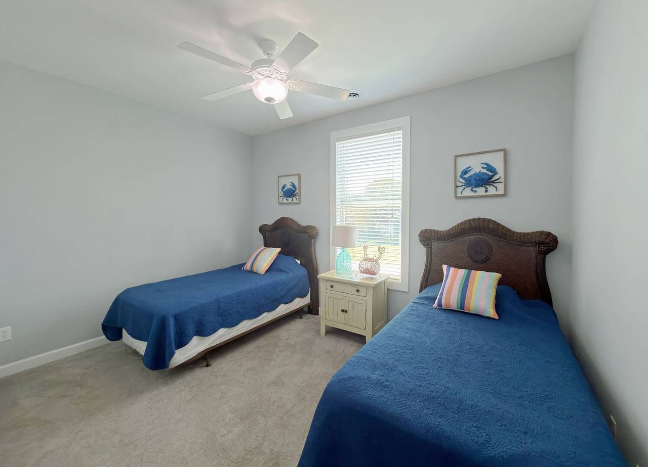 Bedroom 1 Down - 2 Singles Bedroom 1 Down - 2 Singles