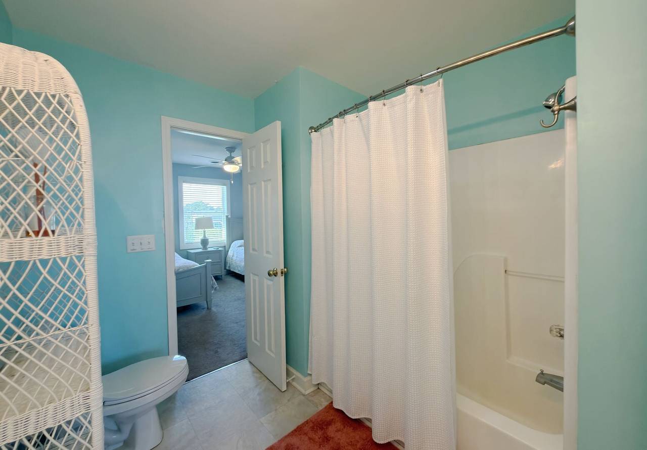 Tub/Shower Combo (shared between bedroom 2 & 3) Tub/Shower Combo (shared between bedroom 2 & 3)