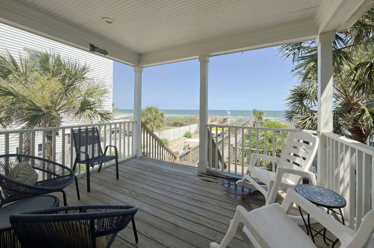 Feel the ocean breeze from the covered porch. Feel the ocean breeze from the covered porch.