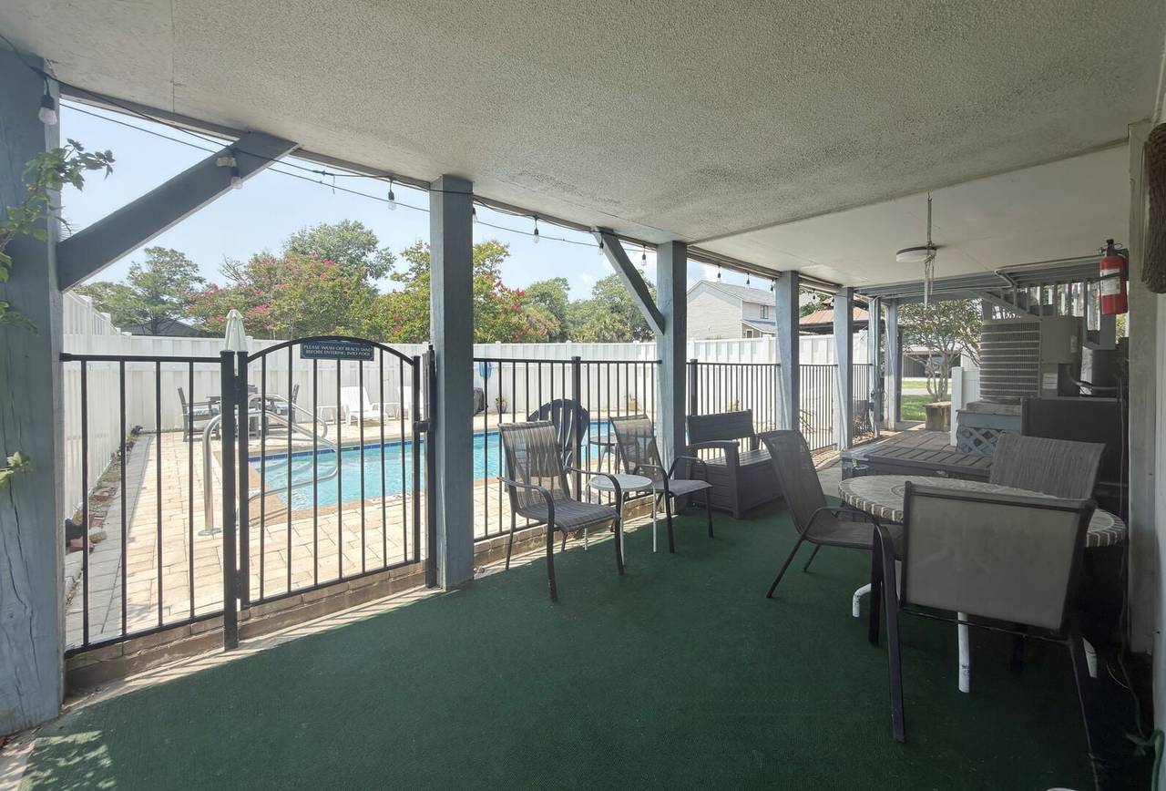 Spacious covered area next to the pool. Spacious covered area next to the pool.