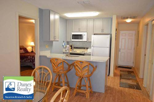 View of Entry and Kitchen View of Entry and Kitchen