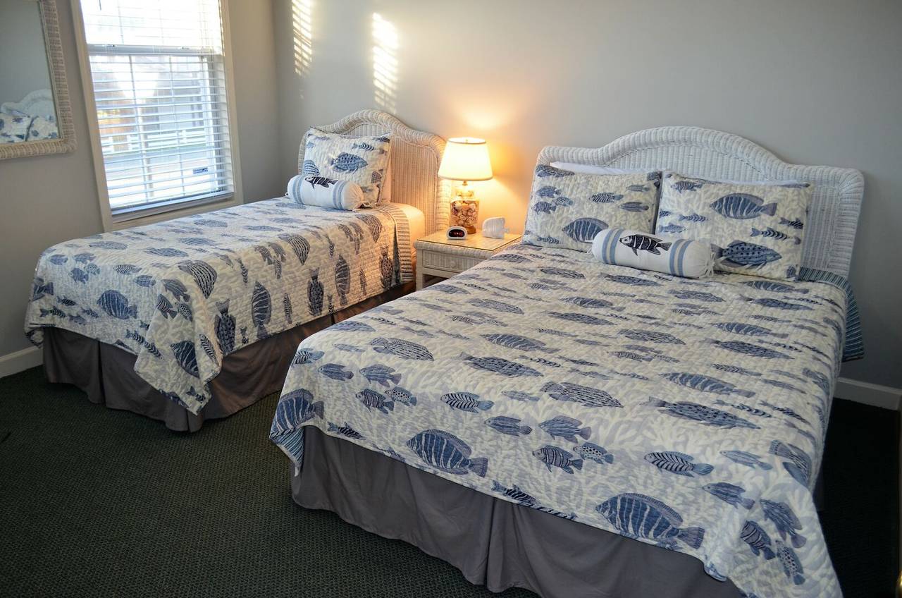 Bedroom 1 Down - 1 Queen & 1 Twin Bed Bedroom 1 Down - 1 Queen & 1 Twin Bed