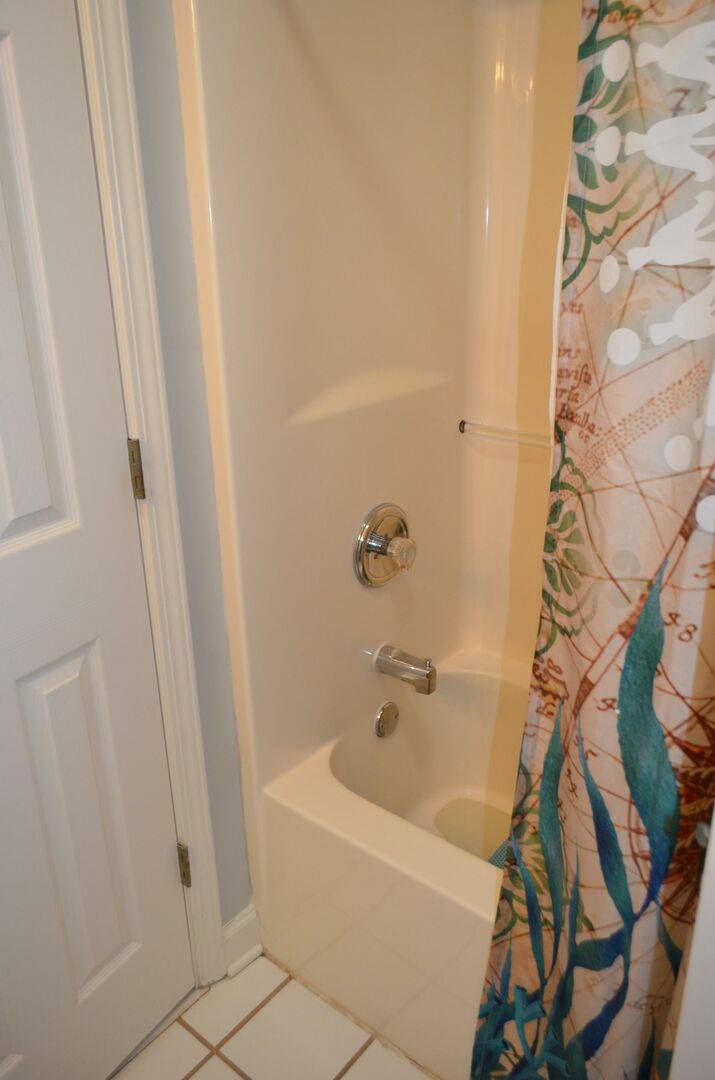 Jack & Jill Bathroom has a Shower/Tub Combo Jack & Jill Bathroom has a Shower/Tub Combo