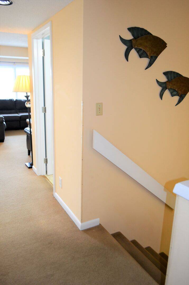 Stairway to Ground Level Bedrooms & Bathrooms Stairway to Ground Level Bedrooms & Bathrooms